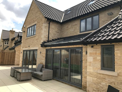 Stunning Installation of Project Doors Bifolding Doors in Grey 